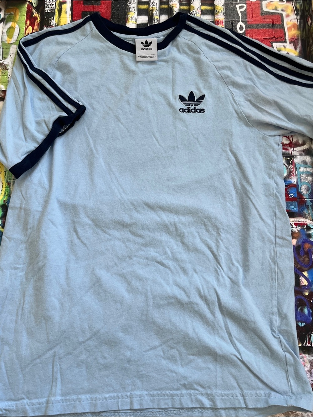 adidas Light Blue Tee with Navy Trim and Three-Stripe Shoulders